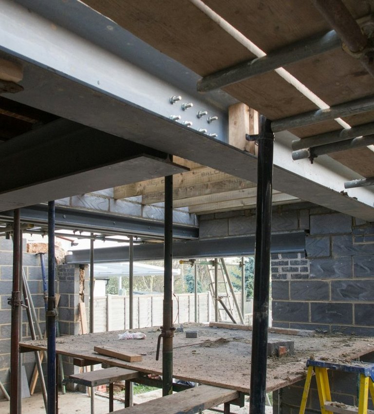 Structural alteration with steel beams fitted